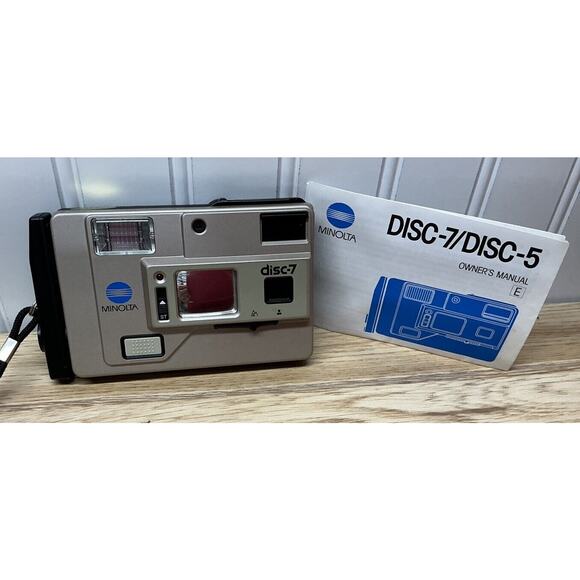 Minolta Disc-7 SELFIE MIRROR Compact Disc Film Camera Untested‎ With Manual - Picture 2 of 8